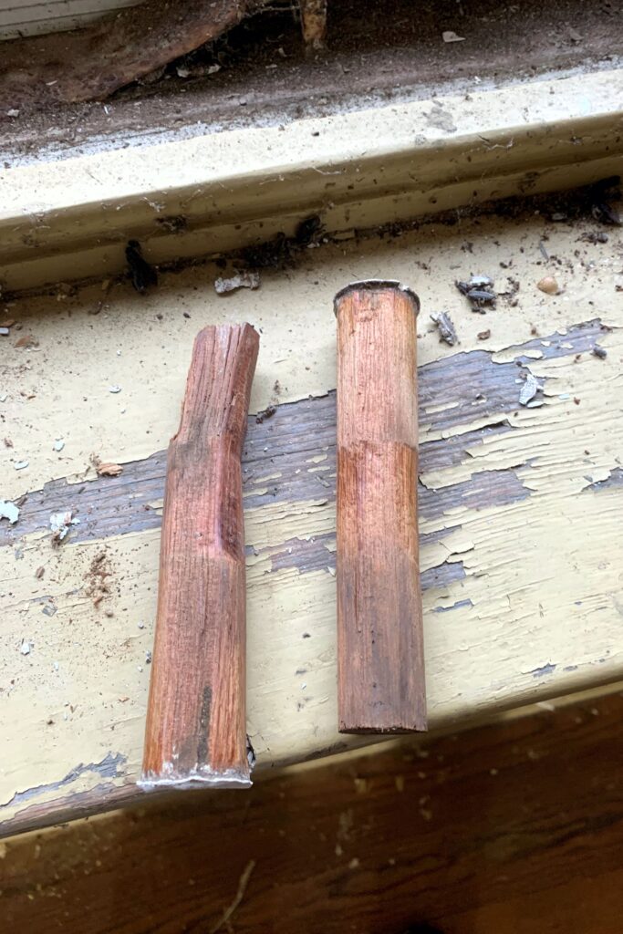 Wooden pegs used to fasten the window sashes